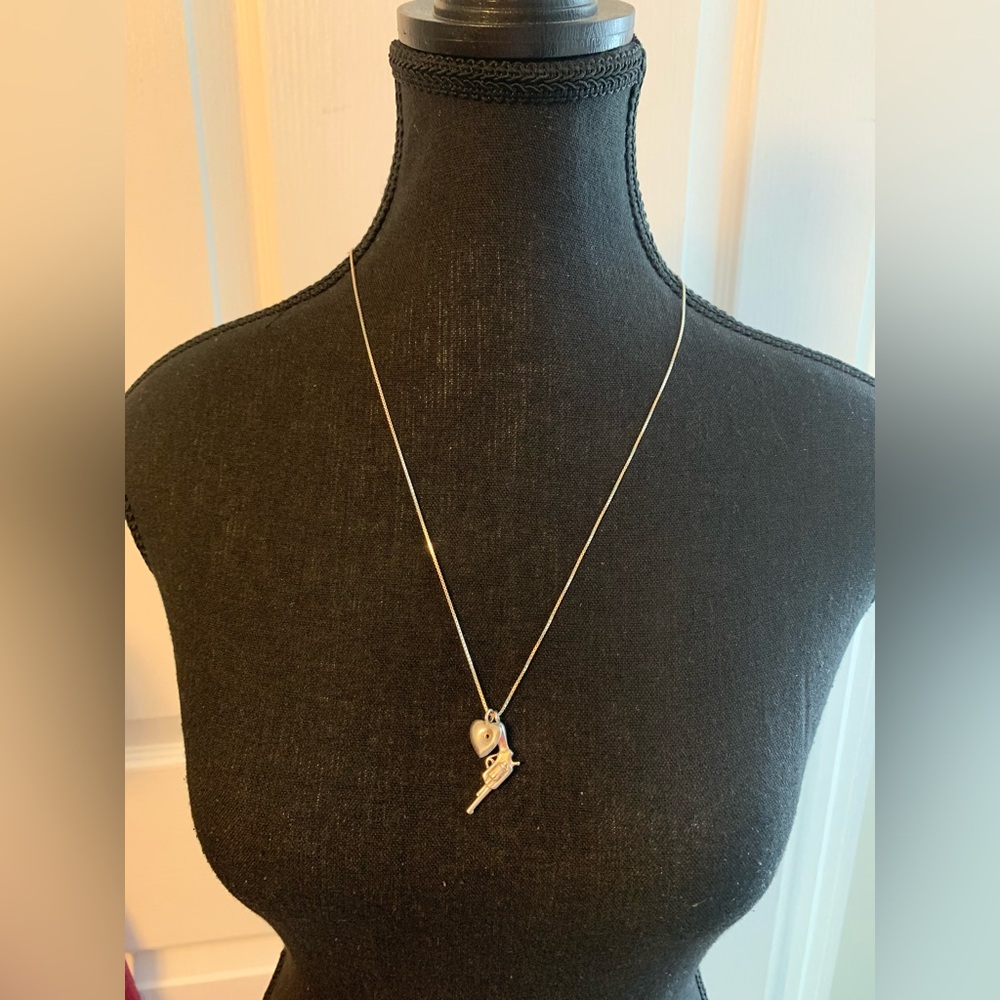 Conversation piece “925” gun & heart pendants  24” on box link silver chain